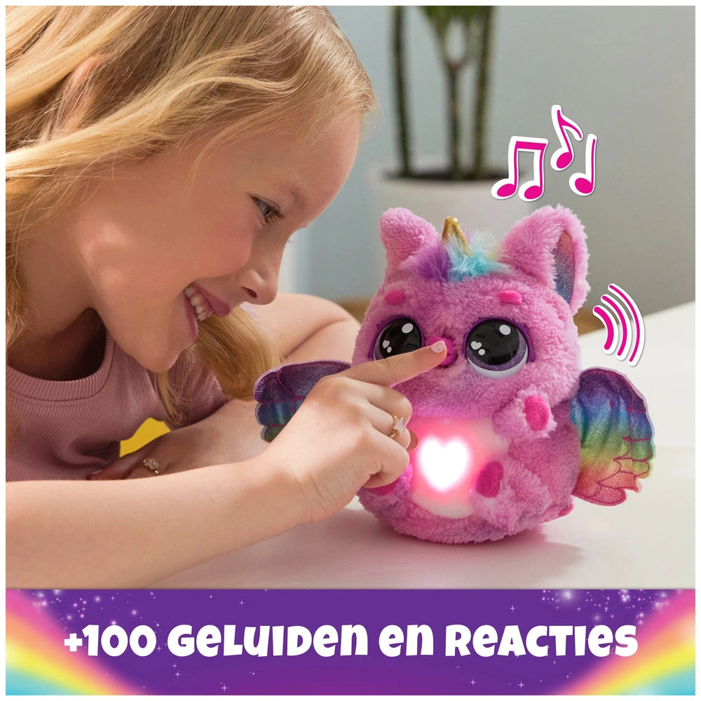 Hatchimals Alive Mystery Hatch Pufficorn plush toy in vibrant pink with rainbow accents, held by a smiling girl in a pink top