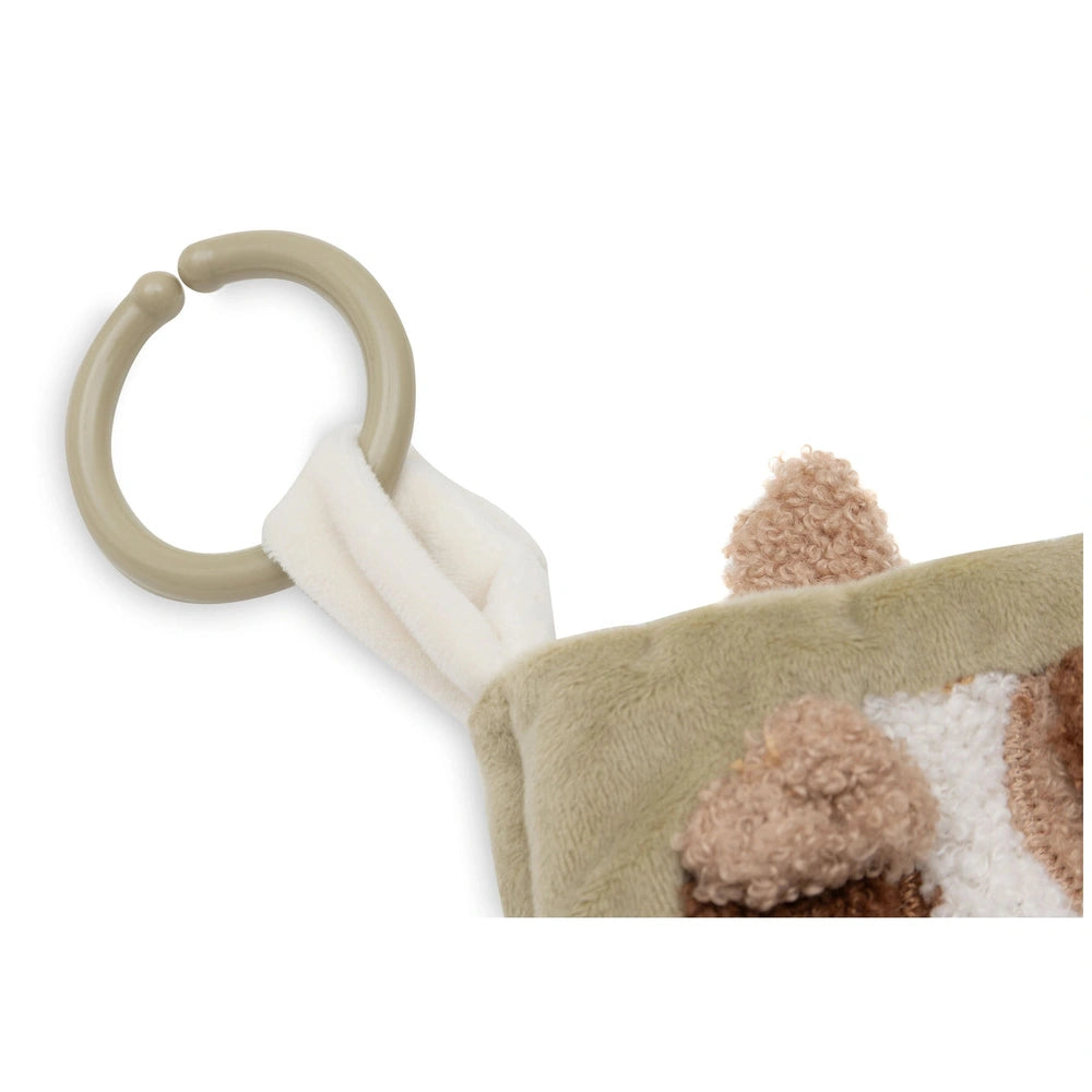 Jollein soft activity book featuring a beige handle, fabric material, zipper, button, and hook for versatile baby play.