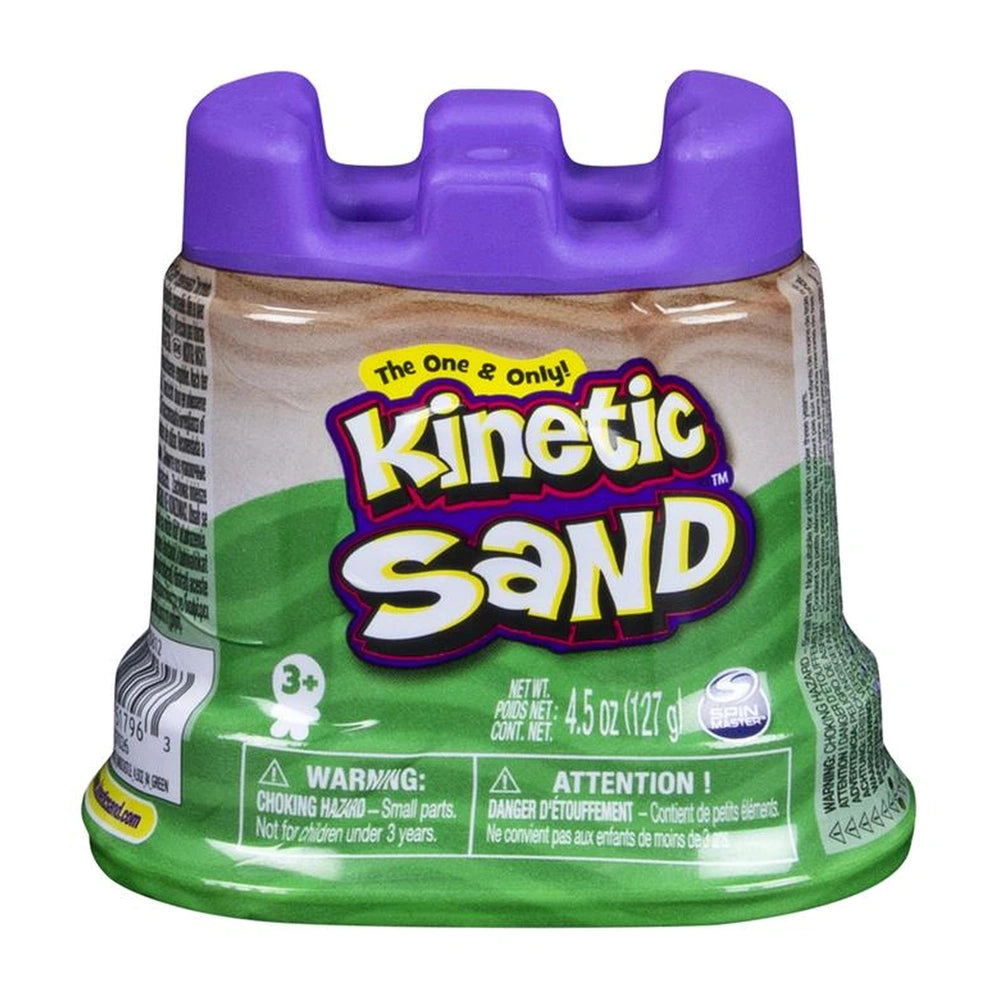 Kinetic Sand container features a purple lid, gradient green-brown body, and a label with text, graphics, and a child's hand.