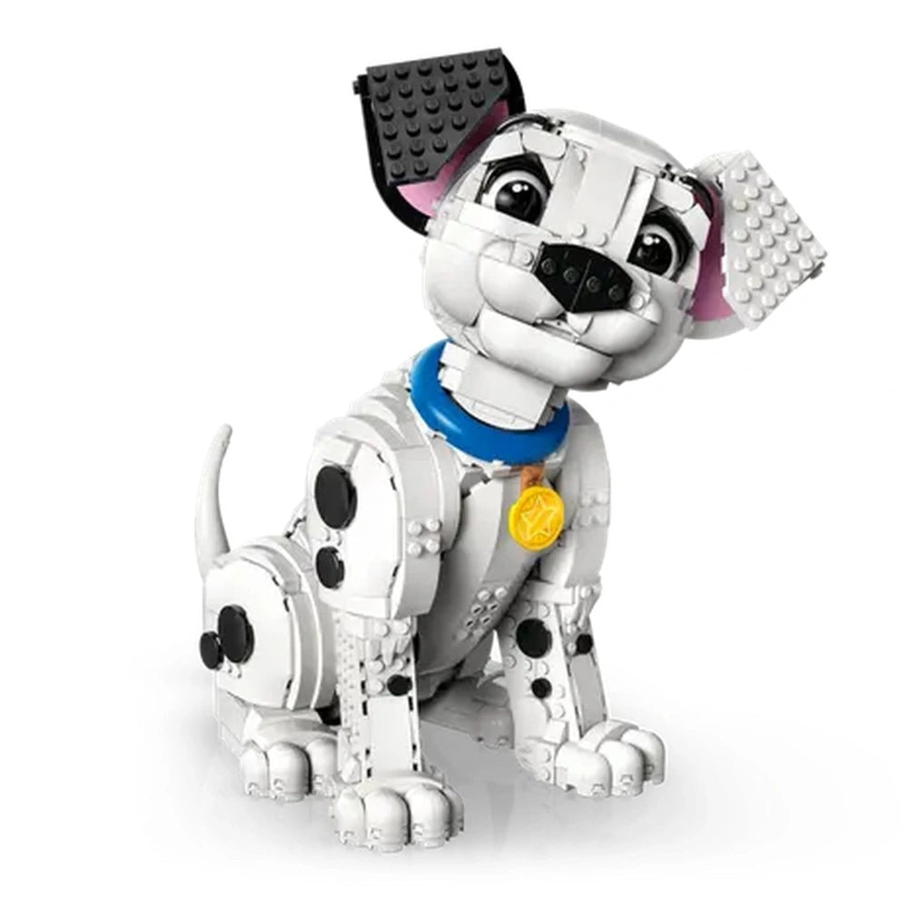 LEGO Dalmatians puppy construction set features a white dog with black spots, a blue collar, and a yellow tag, sitting attent