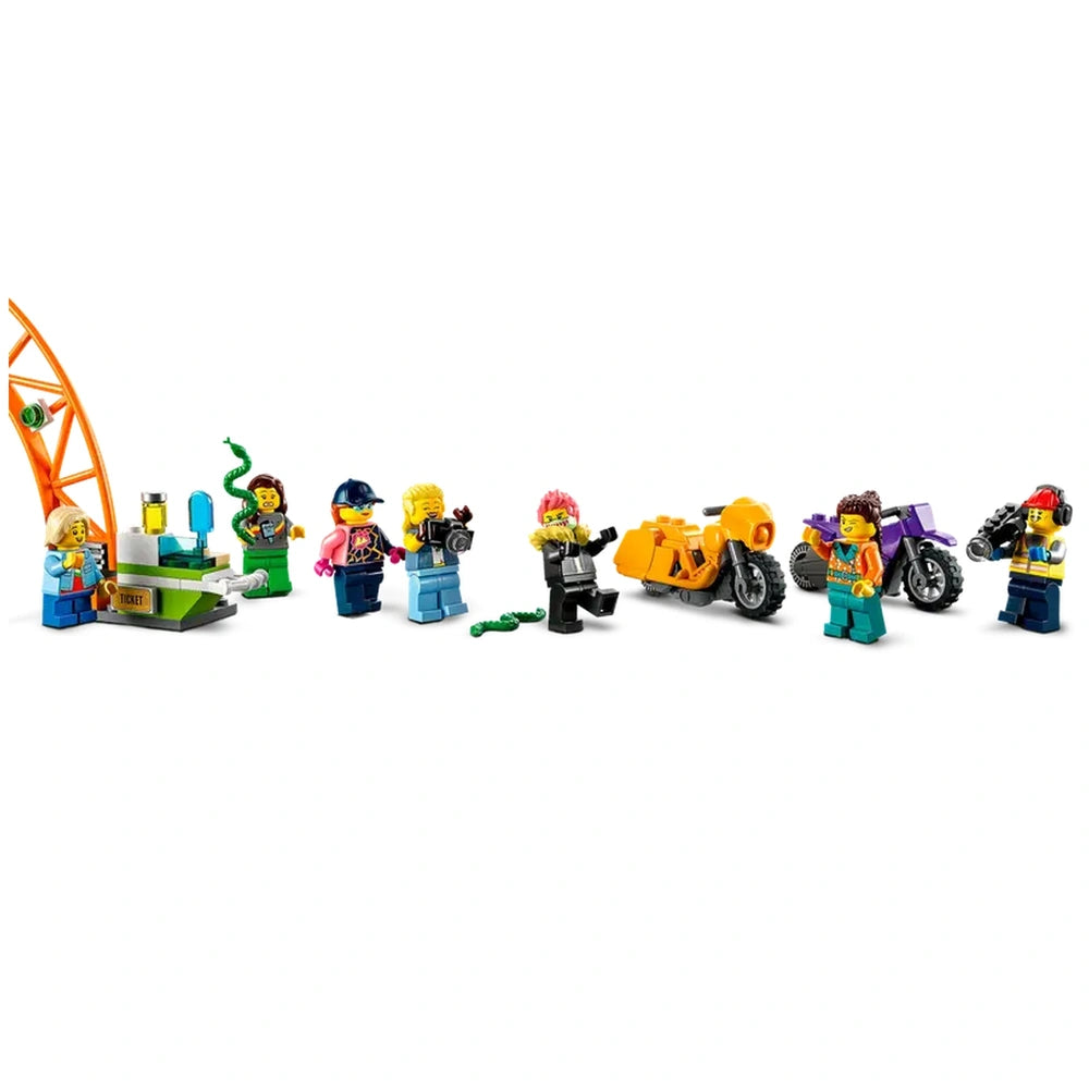 LEGO City Double Loop Stunt Arena featuring colorful minifigures, two stunt bikes, and a ticket booth with vibrant props for thrilling play.