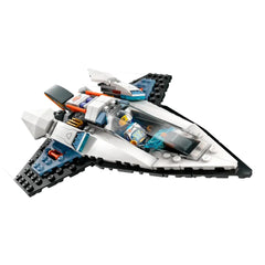 LEGO® City Interstellar Spaceship set featuring a sleek, black and white spacecraft with a clear cockpit, piloted by an astronaut minifigure. The ship has vibrant orange and blue accents, and dynamic fold-out thrusters, designed for imaginative space adventures.