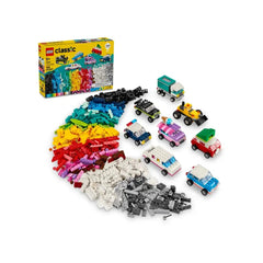 Colorful LEGO bricks scattered in a vibrant assortment, alongside various assembled vehicle models, with the box in the background.