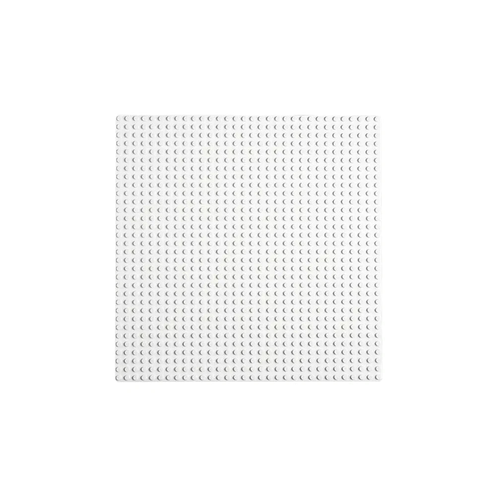 White LEGO Classic baseplate measuring over 9.5 inches square, featuring a smooth surface with a 32x32 stud layout for imaginative building.