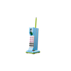 Retro LEGO construction set resembling a vintage telephone, featuring a blue body, pink buttons, and a green antenna, designed for creative play.