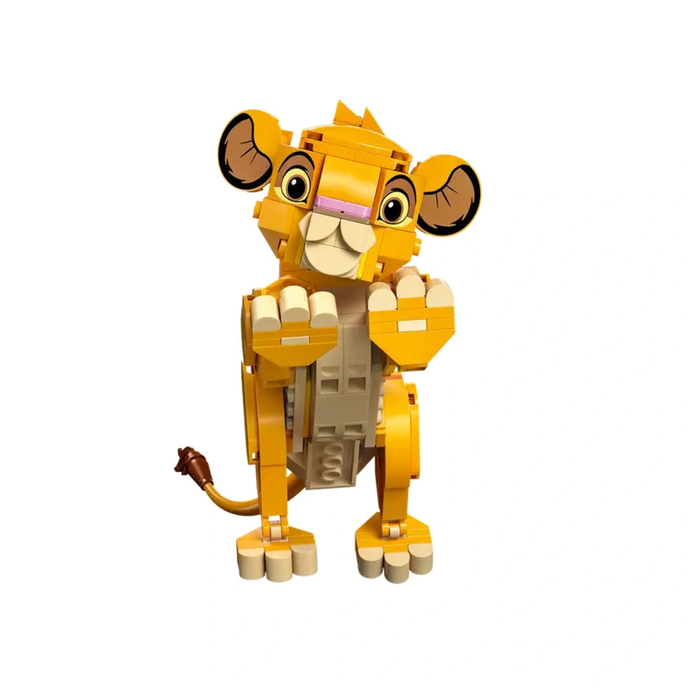 Bright yellow LEGO® Simba figure from The Lion King, featuring movable legs and tail, with a playful expression and raised paws.