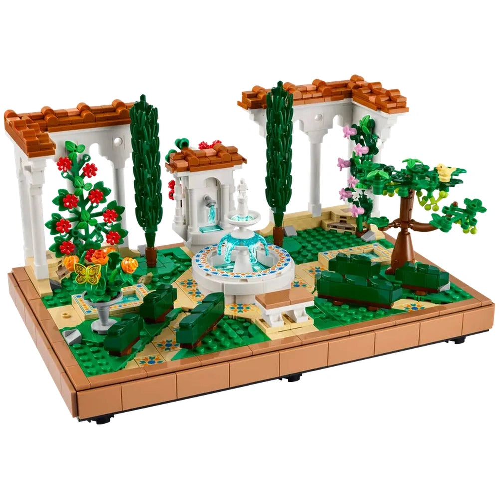 Lush LEGO® Icons Fountain Garden with a tiered fountain, colorful flowers, decorative pathways, and elegant pergolas.