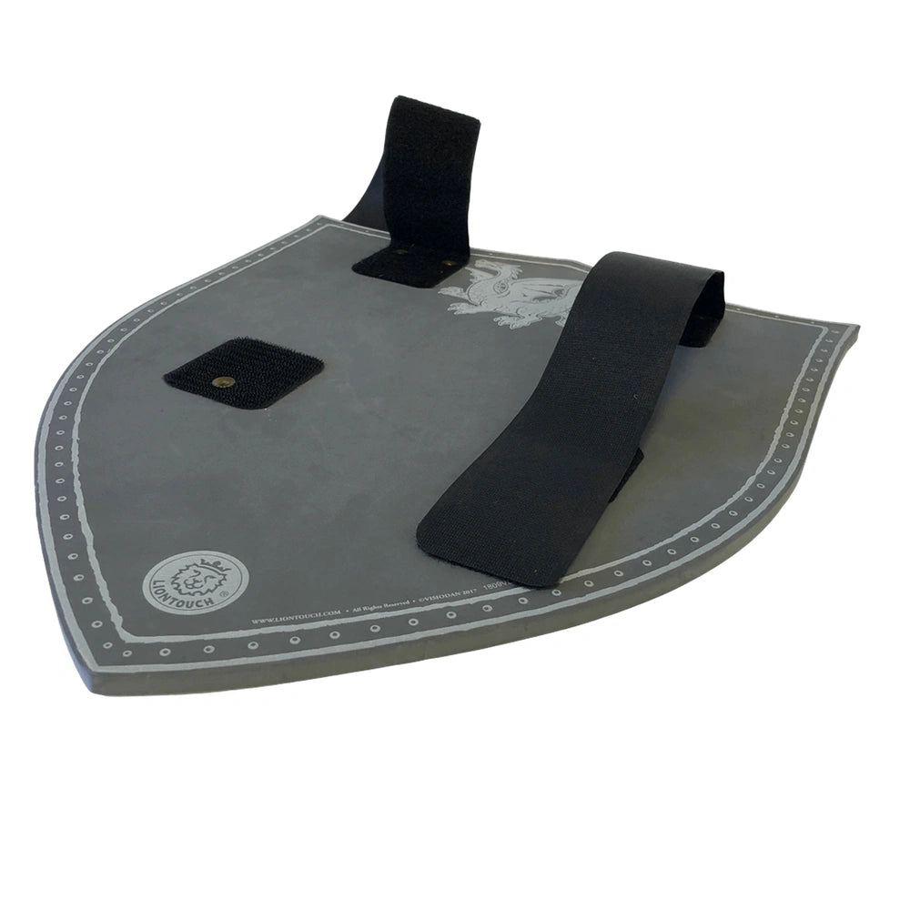 Amber Dragon Shield on a gray fabric surface with two black straps, designed for pretend professions and role playing.