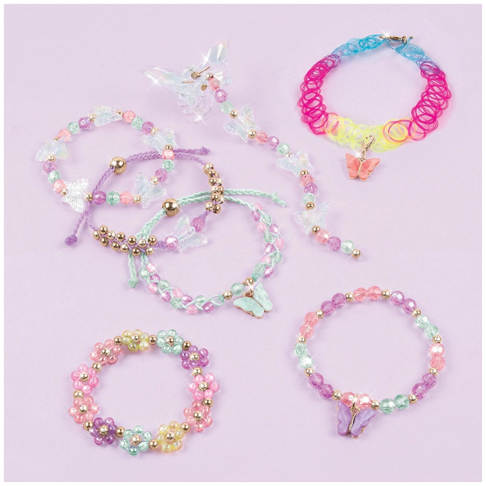 Butterfly jewelry set featuring shiny pink, blue, green, purple, yellow, and clear beads made from plastic and glass.