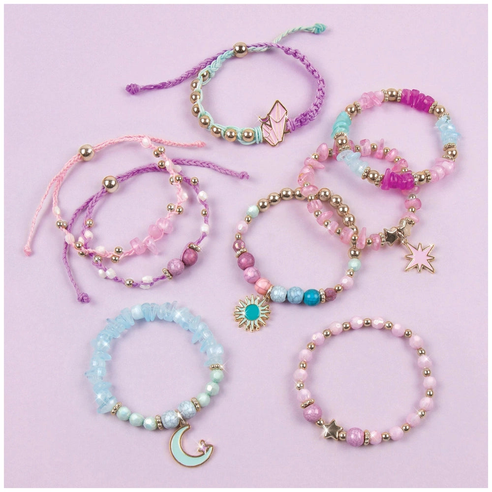 Colorful celestial stones bracelets featuring pink, blue, white, clear, silver, gold, and purple beads with metal charms.