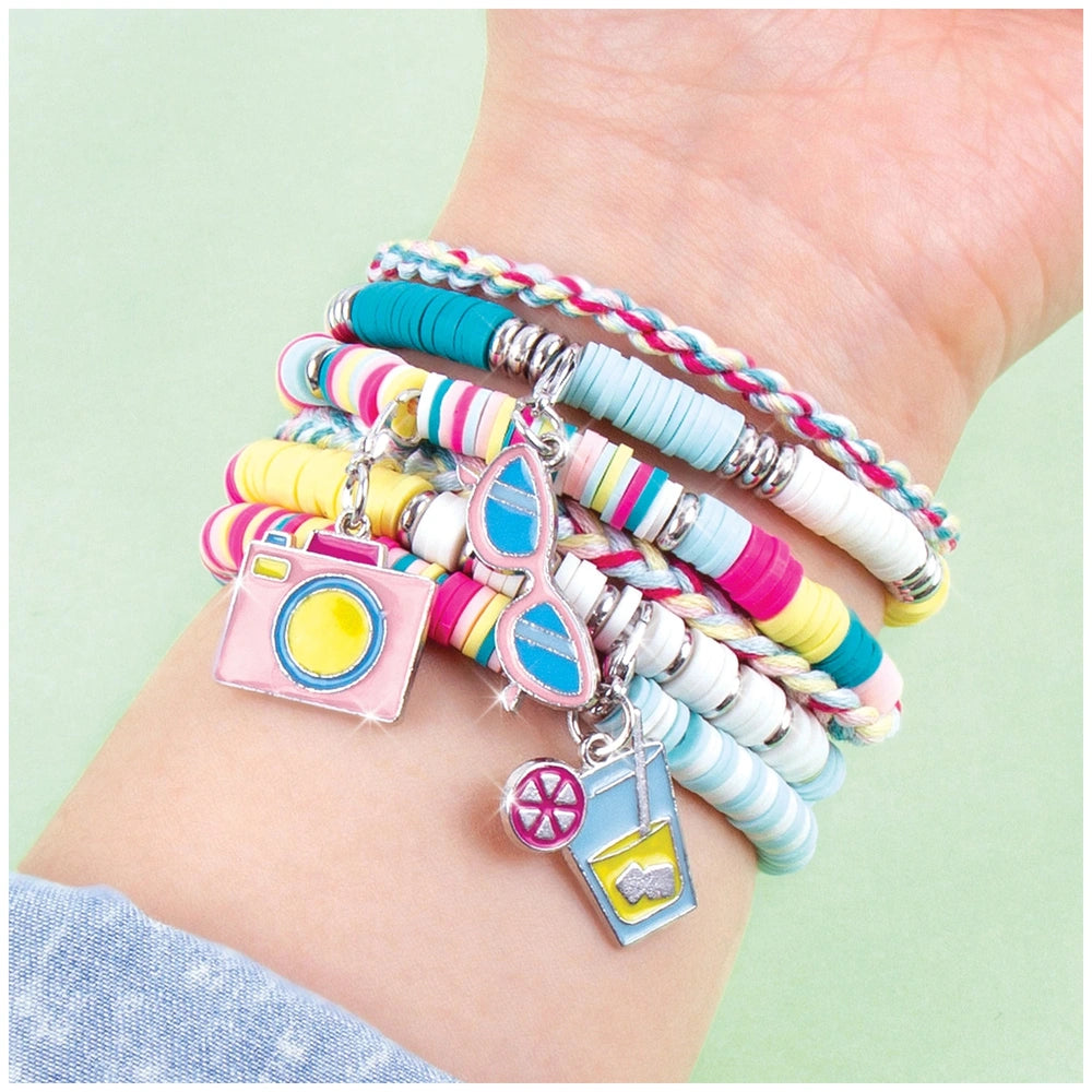Summer Vibes Heishi Bead Set bracelet featuring glossy pink, blue, yellow, and white beads with a silver clasp and heart char