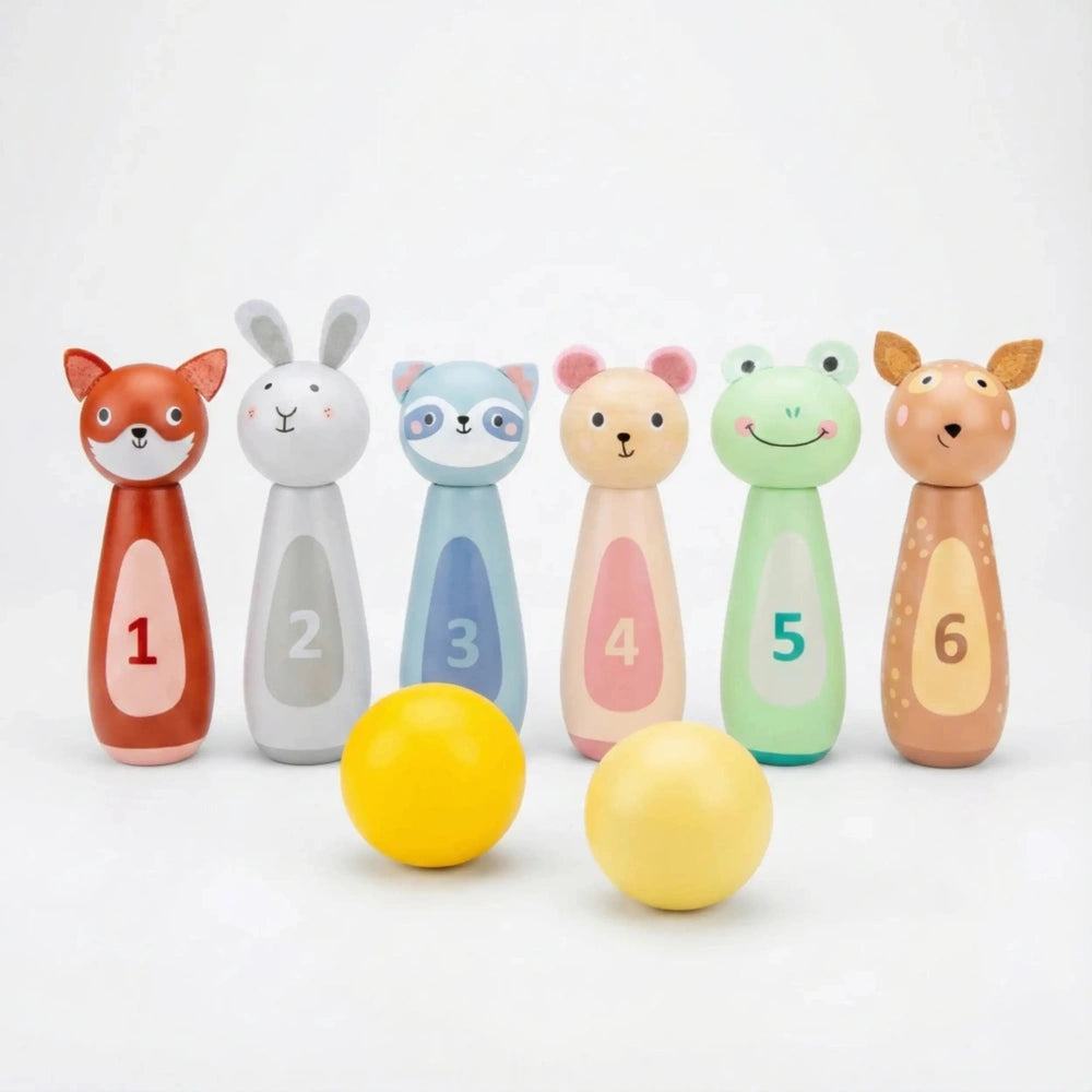 Bowling set featuring six vibrant animal figures in glossy plastic, arranged in a line with smiling faces and numbers 1-6.