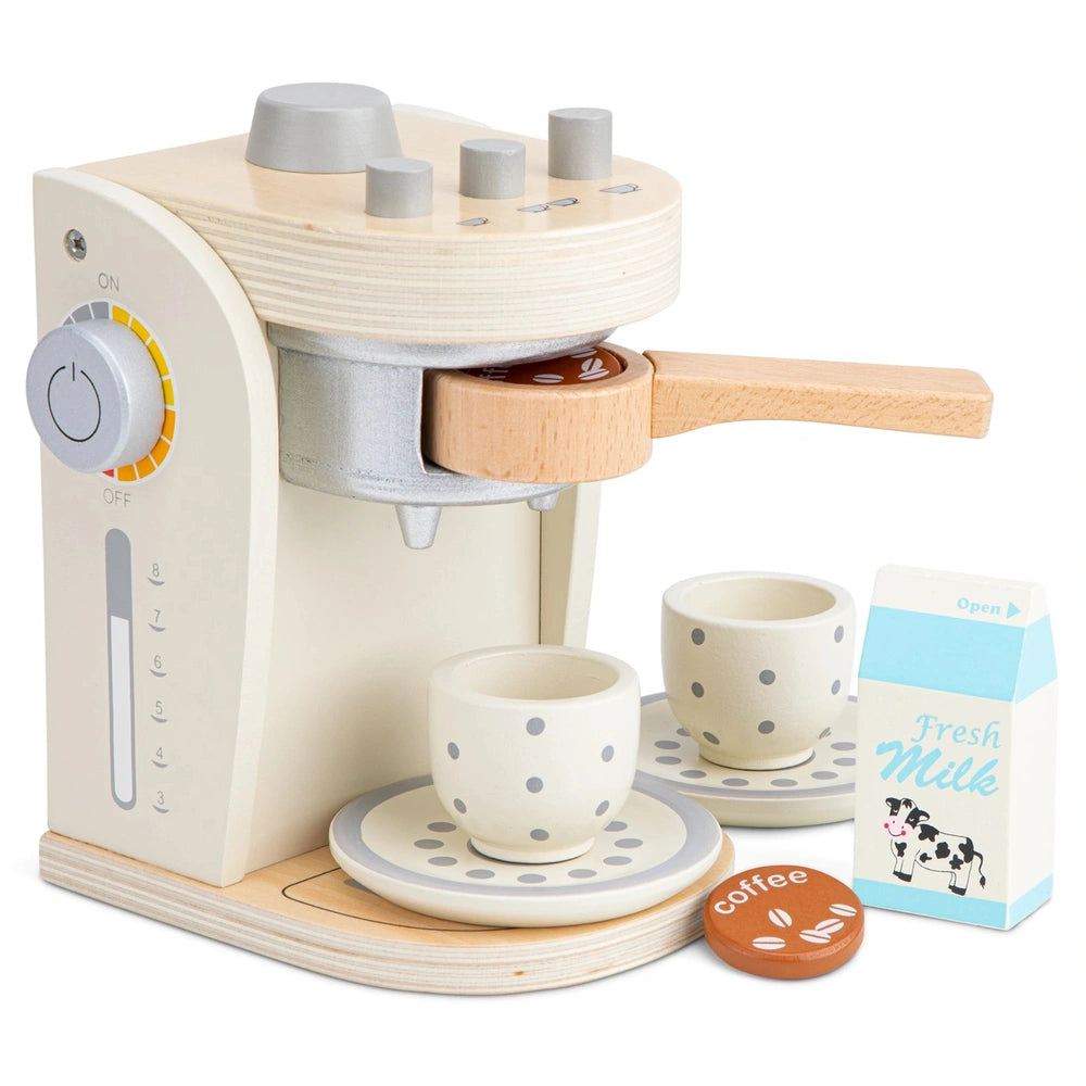 White wooden coffee machine with brown polka dots, accompanied by a brown coffee cup and lid, in cardboard packaging.