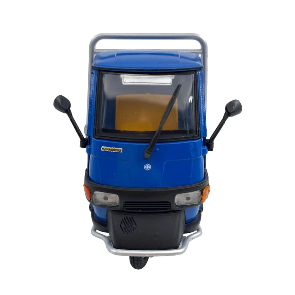 Piaggio Ape 50 Cross Country 1:18 die-cast vehicle with a blue body, black handles, and orange front light.