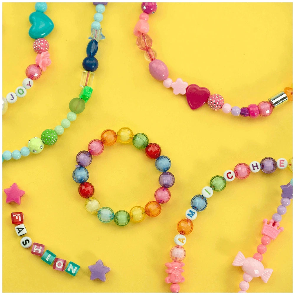 Beads ABC Candy Beads Jar featuring colorful beads spelling "JOY," "MICHELLE," and "FASHION" in a vibrant arrangement.