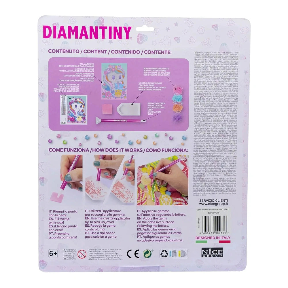 Diamantiny Crystal Art Design Set packaging features vibrant beads, instructional diagrams, and a pink background.