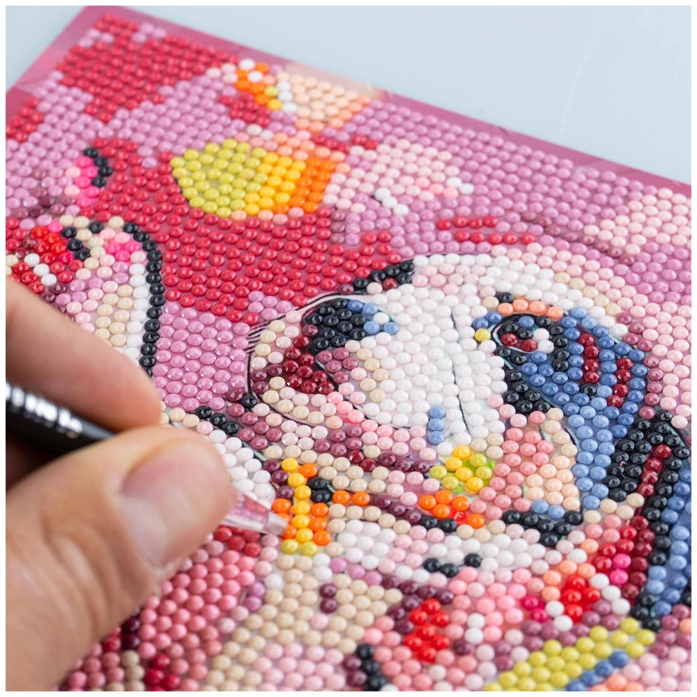 NICE Diamantiny Pets Coloring Arts Crafts features a glossy textured surface with a hand holding a pen.