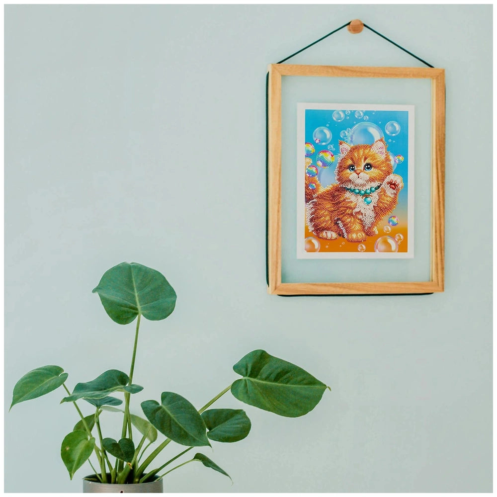 NICE Diamantiny Pets Coloring Arts Crafts features a cat picture in a blue frame with a plant in a gray pot beside it.