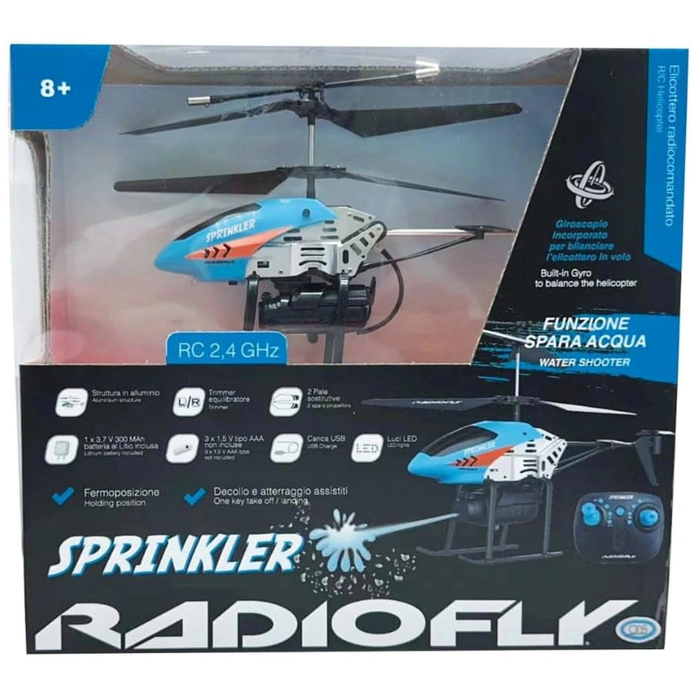 ODS Radiofly RC helicopter in blue and white packaging with glossy finish, featuring various product details and icons.