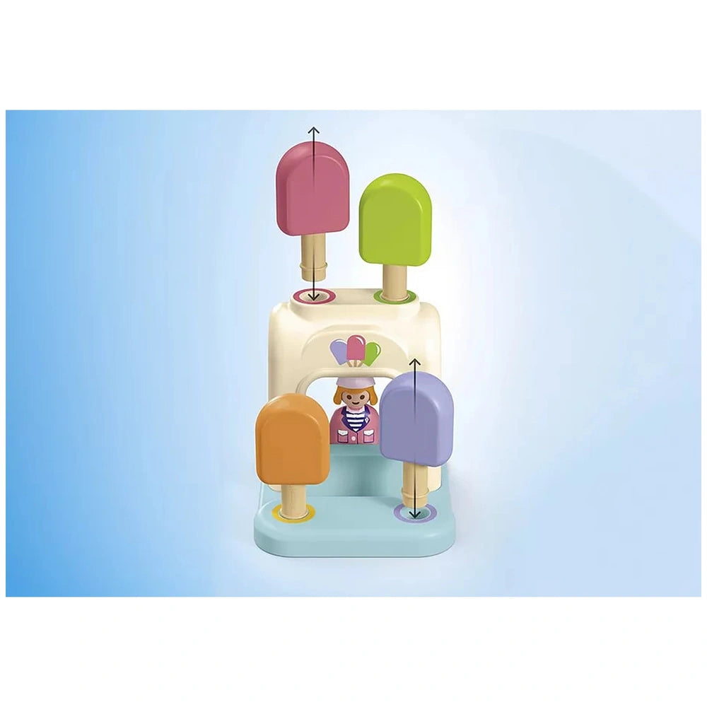 Playmobil Adventure Tower toy playset featuring a white ice cream machine with colorful plastic scoops and a blue surface.
