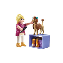 Playmobil Dog-Groomer toy set featuring a plastic doll and dog, with blue collar and brown leash.