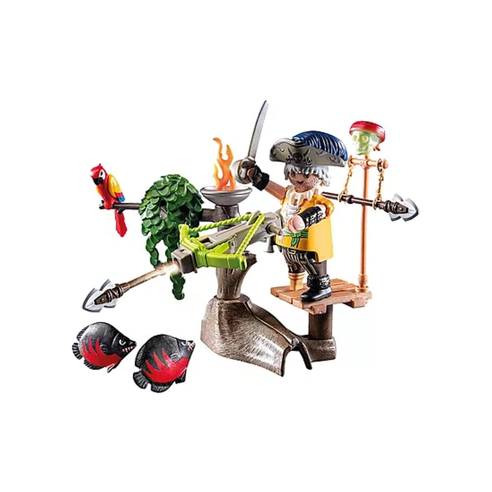 Playmobil Pirate-with-Ballista toy set featuring a yellow figure, fish, and green plant on a brown and orange base.