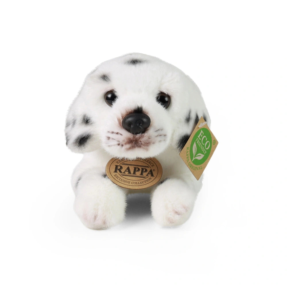 Plush Dalmatian stuffed animal with black spots, soft texture, and eco-friendly tag featuring a green leaf symbol.