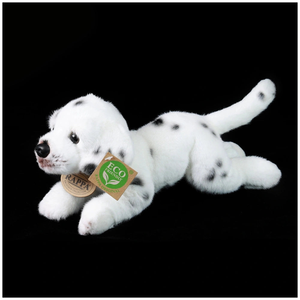 Plush Dalmatian stuffed animal with black spots, lying on a dark surface, featuring an "ECO ORIGINAL" tag with a green leaf s