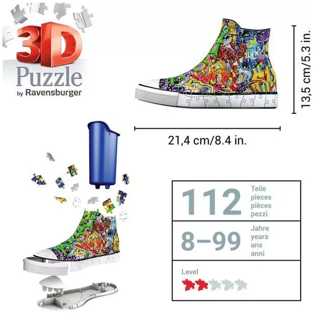 3D puzzle sneaker features a vibrant, graffiti-style design with scattered colorful puzzle pieces around it.