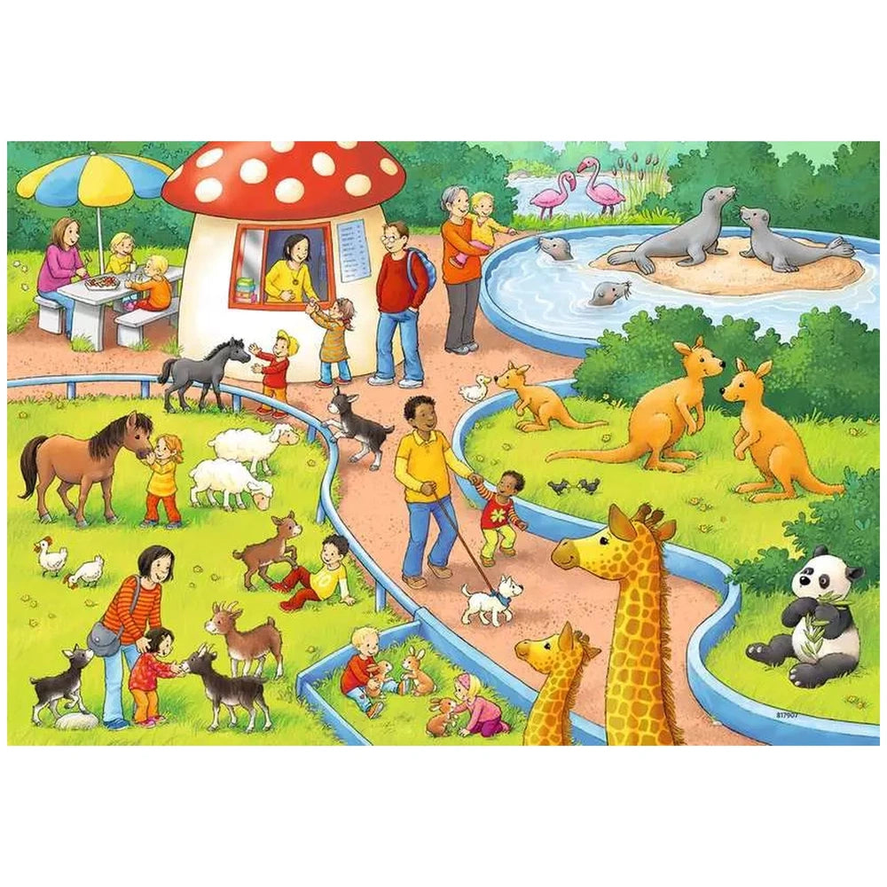 Ravensburger puzzle featuring a vibrant zoo scene with various animals, people, and a picnic area.