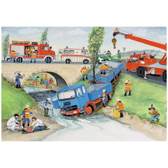Ravensburger puzzle featuring a vibrant cartoon scene of a construction operation with a blue crane truck lifting a red vehic
