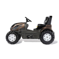ROLLEY TOYS rollyFarmtrac Premium II Valtra is a black and bronze four-wheeled utility vehicle with a roll cage and cargo bed