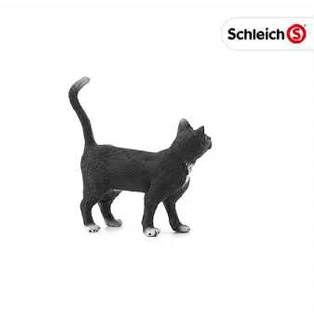 Black cat figurine with a curled tail, standing upright against a plain white background, showcasing its stylized features.