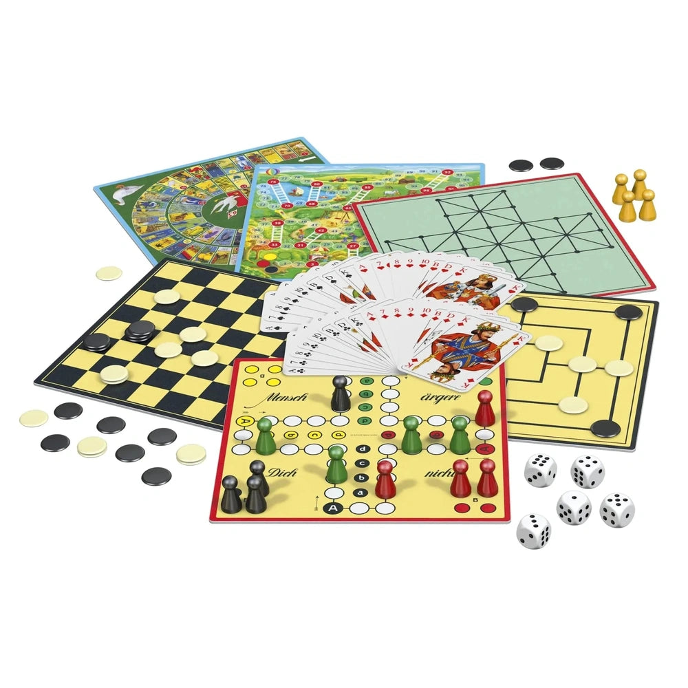 Schmidt Spiele Compact Game Collection features colorful board games, cards, and pieces arranged on a light surface.