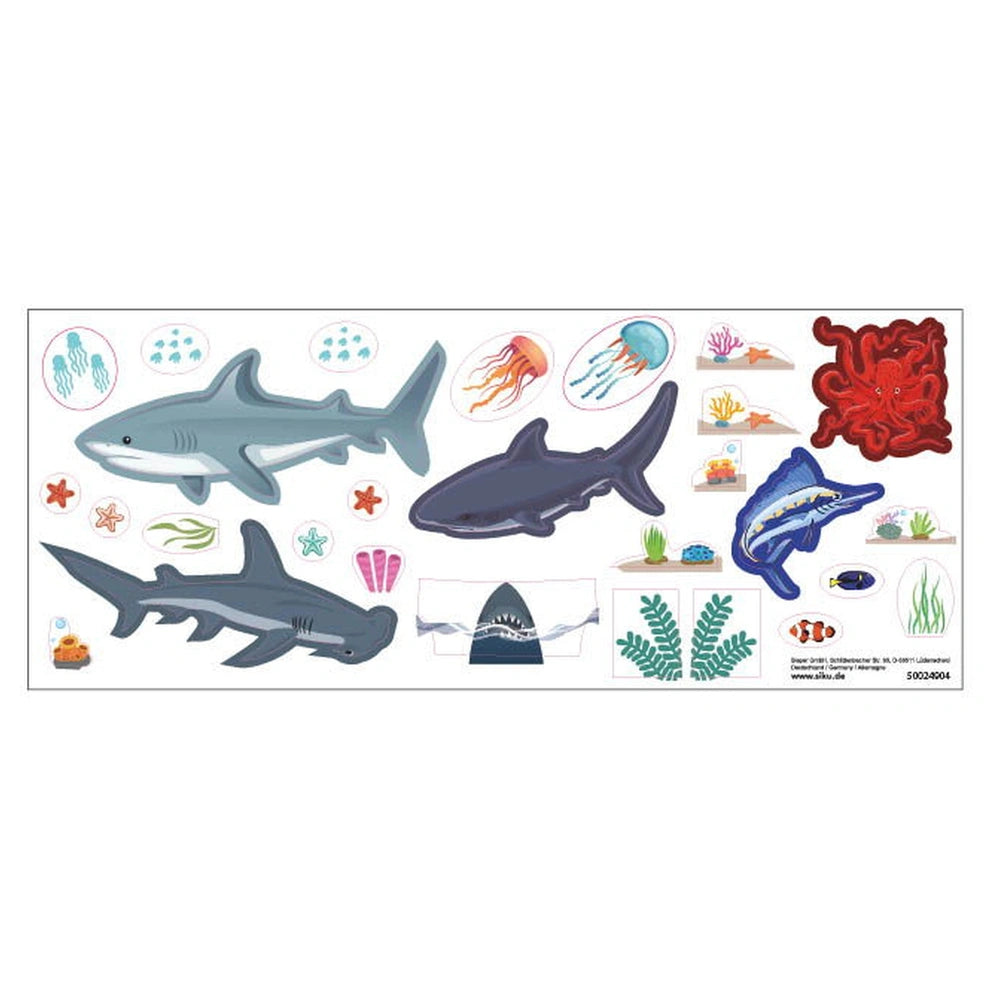 Articulated bus toy in vibrant colors, surrounded by detailed marine life illustrations including sharks, jellyfish, and cora