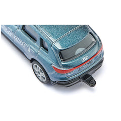 Siku Audi Q4 e-tron toy car in glossy blue with a red stripe, silver wheels, and realistic details displayed at an angle.
