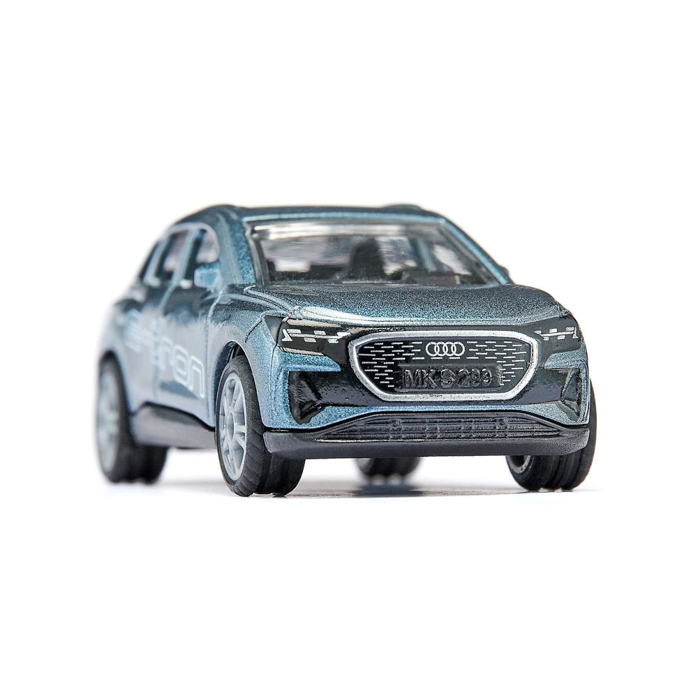 Siku Audi Q4 e-tron model car in dark color with glossy finish, showcasing realistic details against a light background.