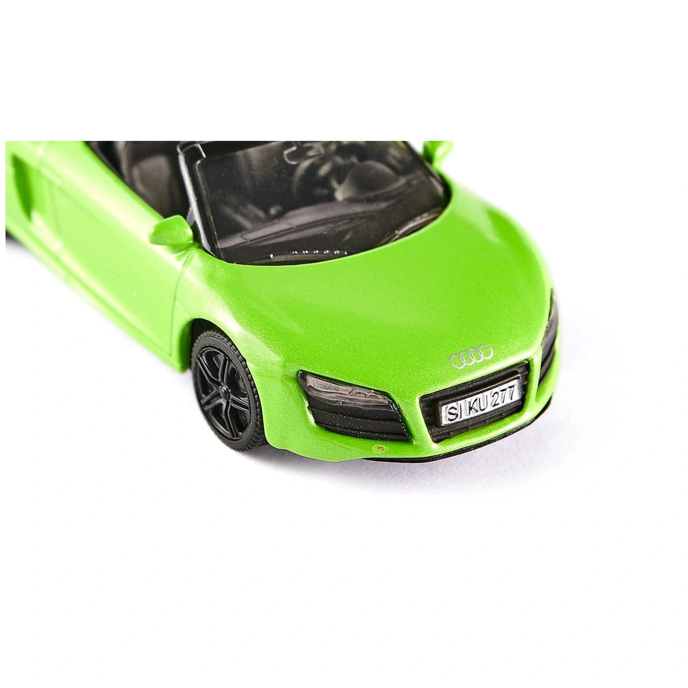 Bright green Siku Audi R8 Spyder toy car model with black accents, displayed on a contrasting white surface.