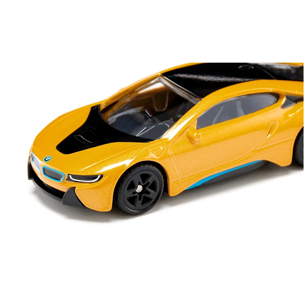 Siku BMW I8 model car in bright yellow with black accents, showcasing a glossy finish and detailed design features.