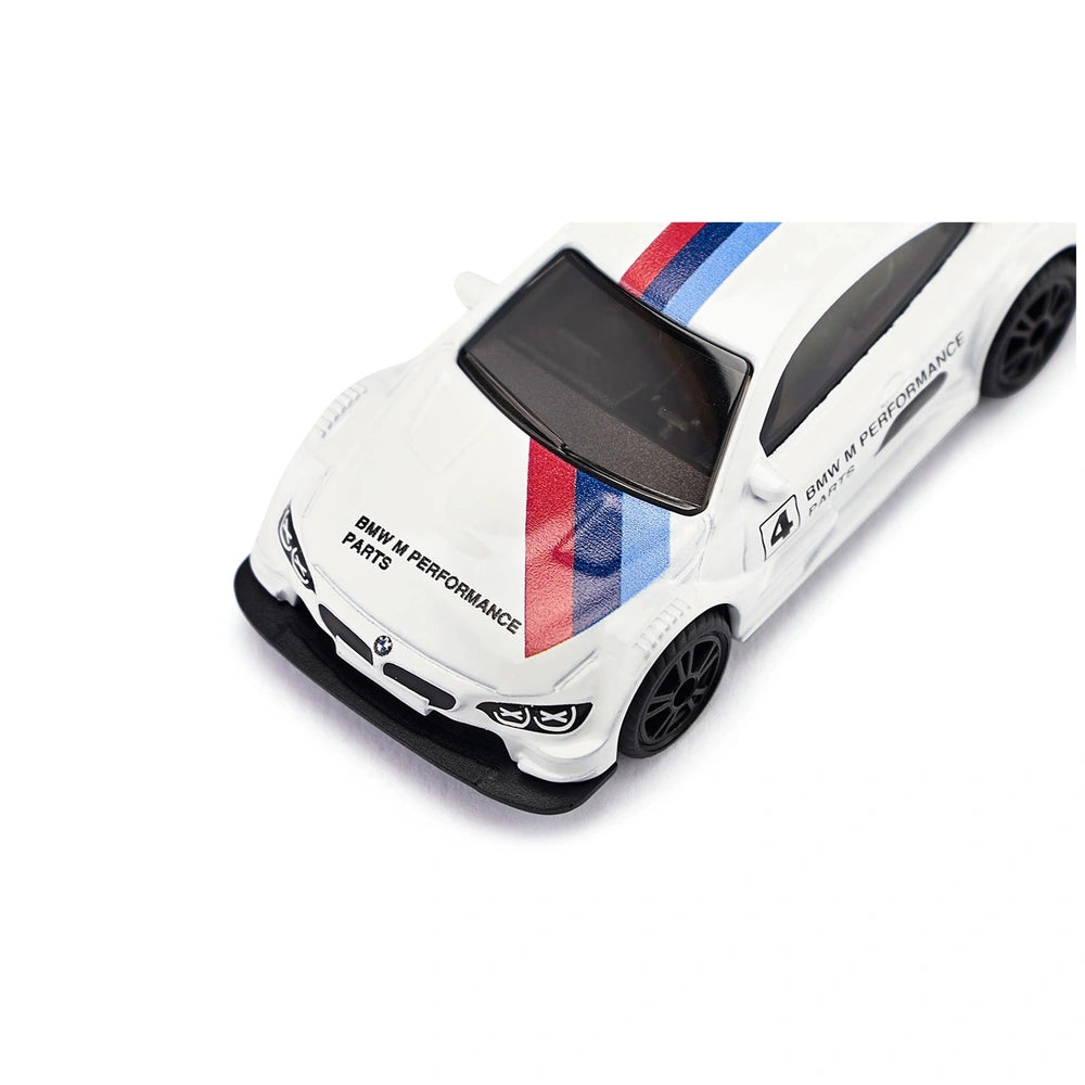 BMW M4 Racing 2016 model car in white with red and blue stripes, featuring logos and a glossy finish.