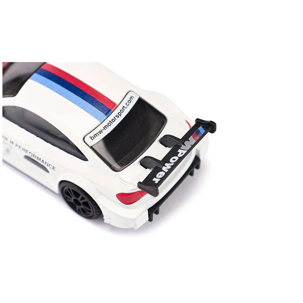 Siku BMW M4 Racing 2016 model features a glossy white body with a red and blue stripe and black multi-spoke wheels.