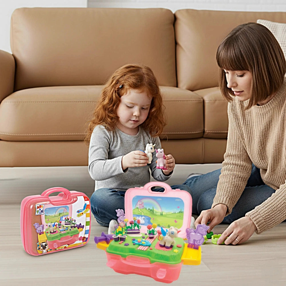 Simba Art & Fun Unicorn Clay Set in Suitcase with a child and adult playing together on a sofa in a cozy living room.