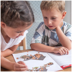 Teifoc - Farm 230 Pcs arts and crafts set with two children engaged at a wooden table, exploring a colorful children's book.