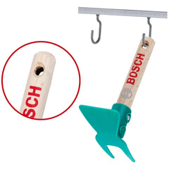 Theo Klein Bosch garden hoe features a wooden handle, green plastic shovel head, and metal hook with red "BOSCH" text.