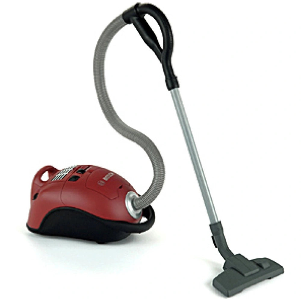 Theo Klein Bosch red vacuum cleaner with silver hose, nozzle, and wand, featuring a black handle and wheels.