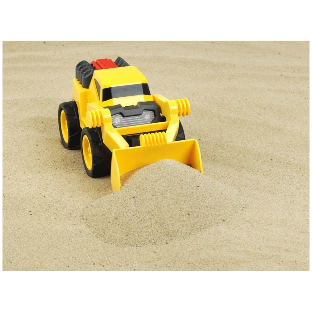 Yellow plastic bulldozer toy on a tan sand surface, showcasing its front view and detailed design.