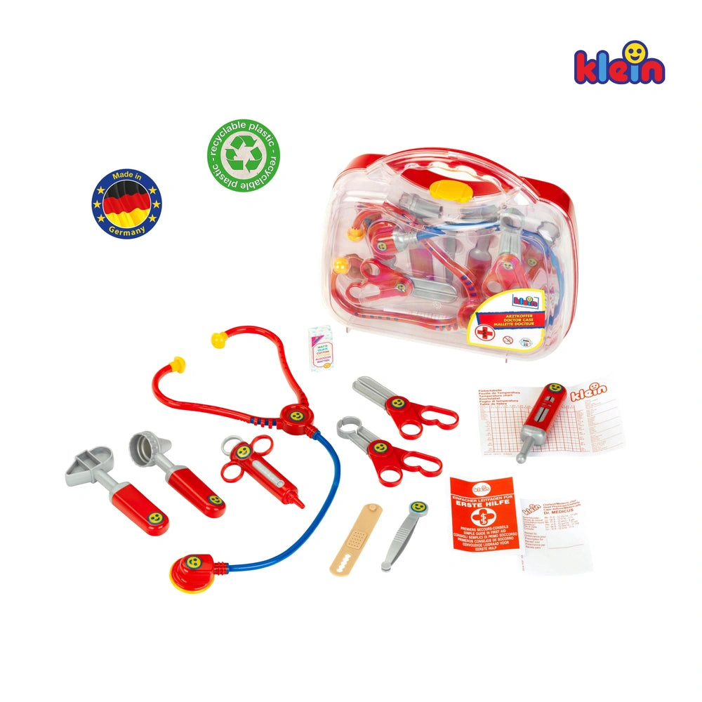 Theo Klein Doctor Case with red plastic medical tools, including scissors, stethoscope, and first aid kit, in a clear contain