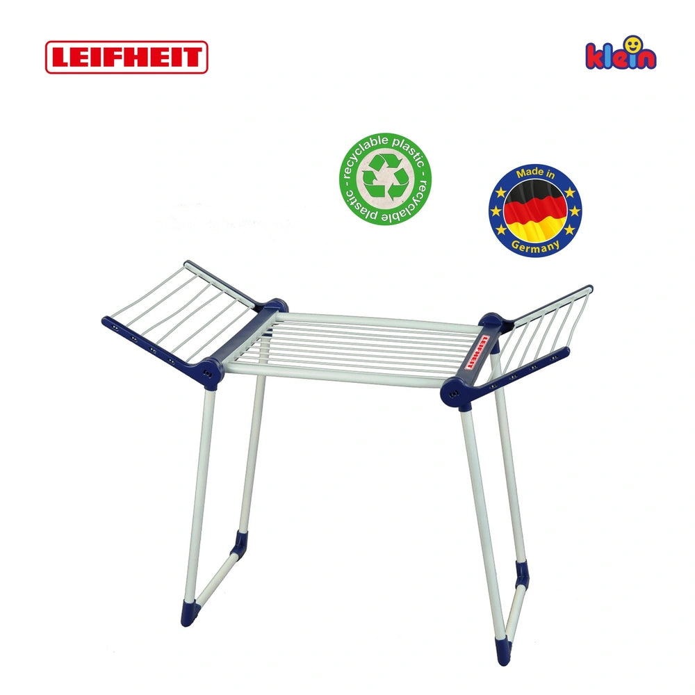 Theo Klein Leifheit drying rack with a white wire mesh top, blue border, and blue legs, made from recyclable plastic.