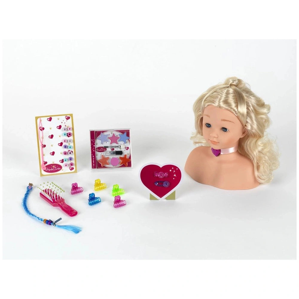 Theo Klein Little Sophia doll head playset with heart-shaped object, hairbrush, and colorful toothbrushes in a matte cardboar