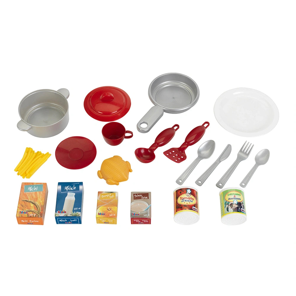 Theo Klein Miele Kitchen Starter set featuring metal utensils and colorful paper carton with various food-related images.
